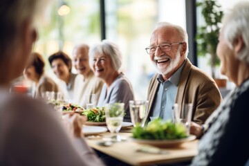 Group of Happy Senior Friends Enjoying Meal Together