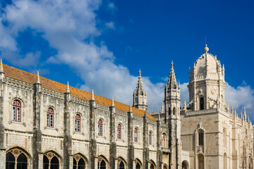 Exterior of the jeronimos monastery or hieronymites monastery, blue sky background,  Lisbon,...