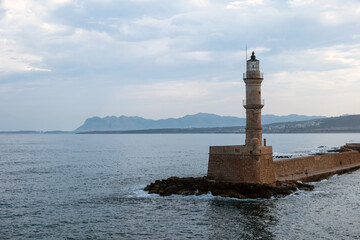 Crete Greece. Lighthouse, beacon at Venetian harbour in Old Town of Chania