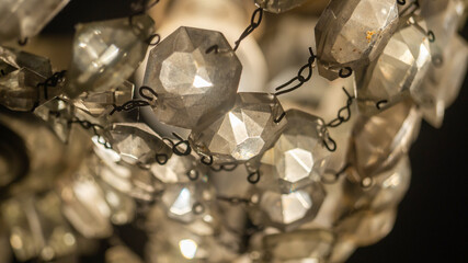 Crystal chain. Crystal stones are interconnected. Old crystal chandelier