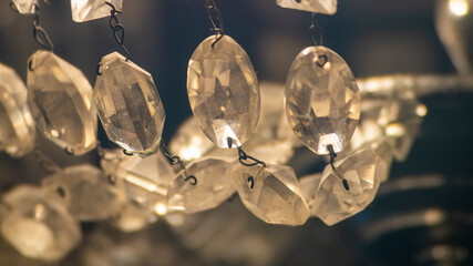 Crystal chain. Crystal stones are interconnected. Old crystal chandelier