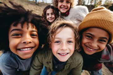Obraz premium Portrait of diverse children taking selfie outside