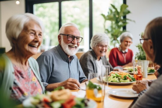 Group of Happy Senior Friends Enjoying Meal Together