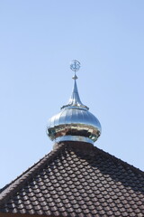 Mosque dome on a sky blue background