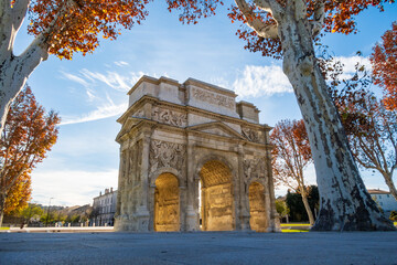 Roman triumphal arch, historical memorial building in Orange city, photography taken in France - obrazy, fototapety, plakaty