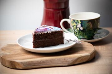 Chocolate cake on a white plate, dessert, delicious piece of chocolate cake, food