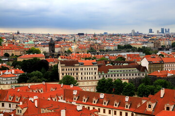 Fototapeta na wymiar Old medieval houses, building, red tiled roofs in Prague, Czech Republic, panorama. Historical buildings in Prague Czechia