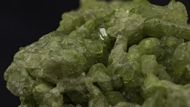 Macro Shot Showcasing Vesuvianite Mineral Formation on Dark Background