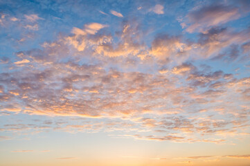 Orange colored altocumulus pre twilight sky