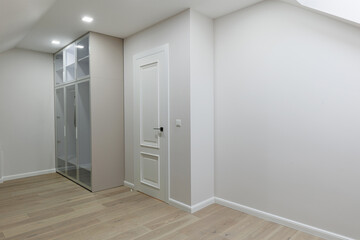 White Glass Wardrobe: Serene Closet Interior with Modern Accents
