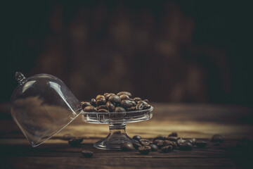 Aromatic coffee beans on a wooden table, coffee beans