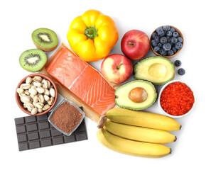 Many different products isolated on white, top view. Natural sources of serotonin