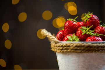 Red strawberries and beautiful background with blur