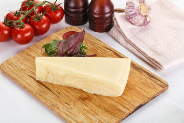 Piece Italian hard parmesan cheese