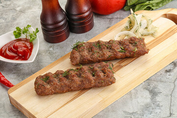 Kebab with beef served onion