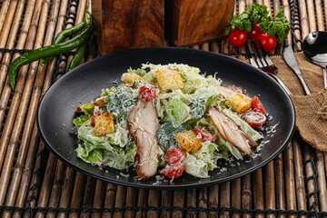 Caesar salad with chicken and romano