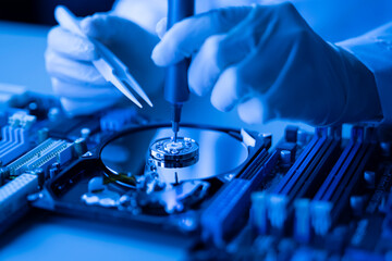 Disassembled hard drive in the service center, fixing the problem with storage