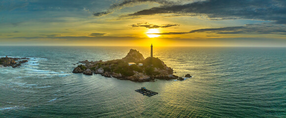 Ke Ga lighthouse is located on an island near the shore seen from above, this is an ancient lighthouse built in the French period to guide the water in the central waters of Vietnam.