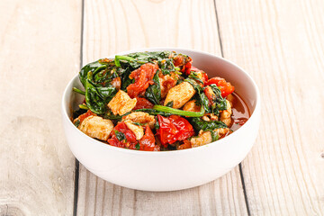 Chicken with tomato and spinach
