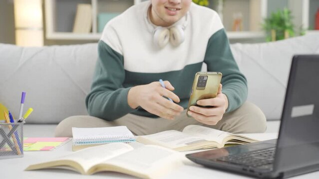 Male student talking on Facetime.