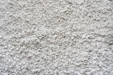 Background of an old wall with splashed cement pattern and white paint. Abstract wall texture backdrop