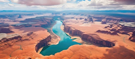Fotobehang aerial view of the Colorado River, Lake Powell, and Trachyte Canyon. © diwek