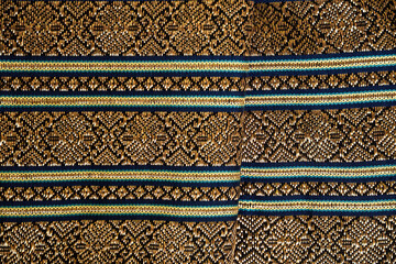 Thai Silk golden fabric pattern hand craft woven unique design.