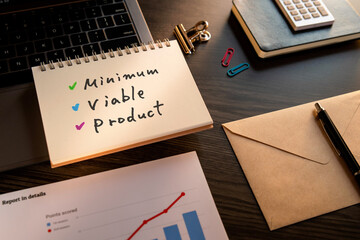 There is notebook with the word Minimum Viable Product. It is as an eye-catching image.
