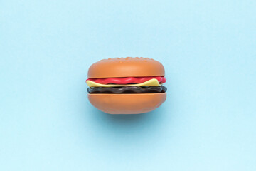 Burger layout on a blue background.