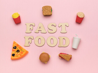 The inscription fast food and takeaway food on a pink background.