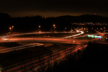 Fototapeta premium long exposure photography of car light trails on swiss highways