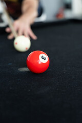 Close up View of Man Playing Pool Table