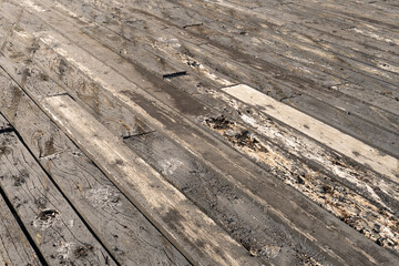 Harbour dock floorboards, old floorboards in perspective, brown wood decking with gaps,.