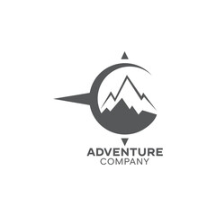 adventure logo with mountain and compass design