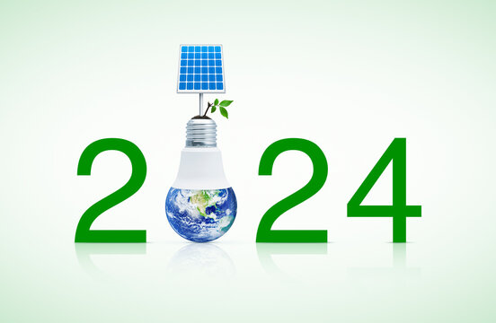 2024 text with solar cell and fresh green tree leaves on soil with earth globe inside led light bulb, Happy new year 2024 green ecology and saving energy, Elements of this image furnished by NASA