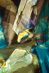 Abstract micrograph of methionine crystals that resemble a glacial front.