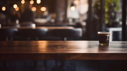 Plexiglas foto achterwand Empty wooden table and coffee shop blur background with bokeh image. © tashechka