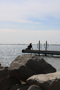 sitting on the pier