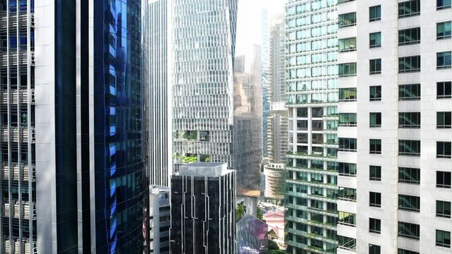 Facades of high rise office buildings in Singapore in morning sunshine