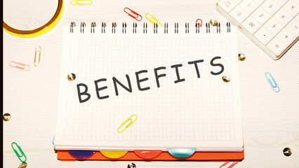 BENEFITS word on a checkered notebook on a light table next to a magnifying glass, paper clips,...