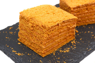 Homemade layered sweet cake Napoleon with honey and cream. - 693808903