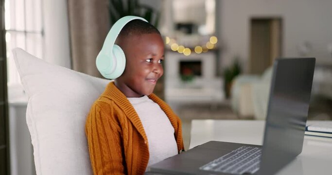 Headphones, laptop and boy child on a video call for math assignment, project or homework. Elearning, technology and young African kid student working on a computer for online distance education.