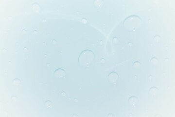 Bluewater waves on the surface ripples blurred. Defocus blurred transparent blue colored clear calm water surface texture with splash and bubbles. Water waves with shining pattern texture background.