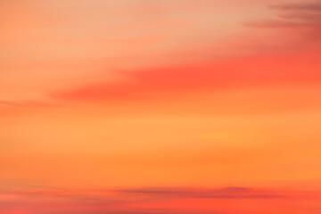 A beautiful sky tinted by the sun leaving vibrant shades of gold, pink, blue and multicolored. Clouds in the twilight evening and morning sky. Image of a cloudy sky in the evening and during the day