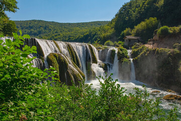 Strbacki Buk, a terraced waterfall on the Una River on the border between the Federation of Bosnia...