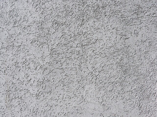 Texture of gray decorative plaster. Raised background or texture