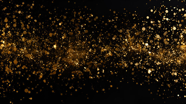 golden sparkles and bokeh on a black background