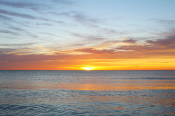Naklejka na ściany i meble natural background beautiful sunrise over the sea