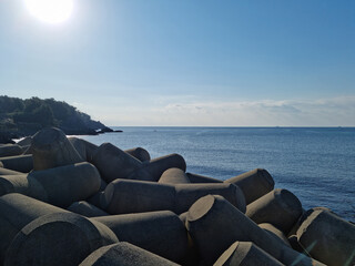 
The blue Jeju sea with a breakwater.