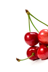 Fresh red cherry berries on a white background, berries for dessert